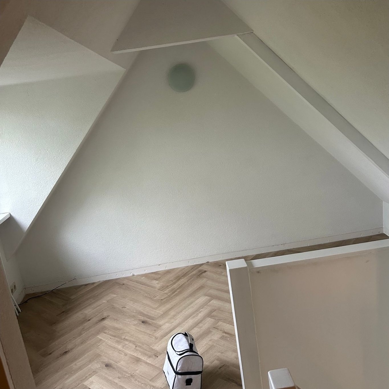 Zolder, bakstenen wand